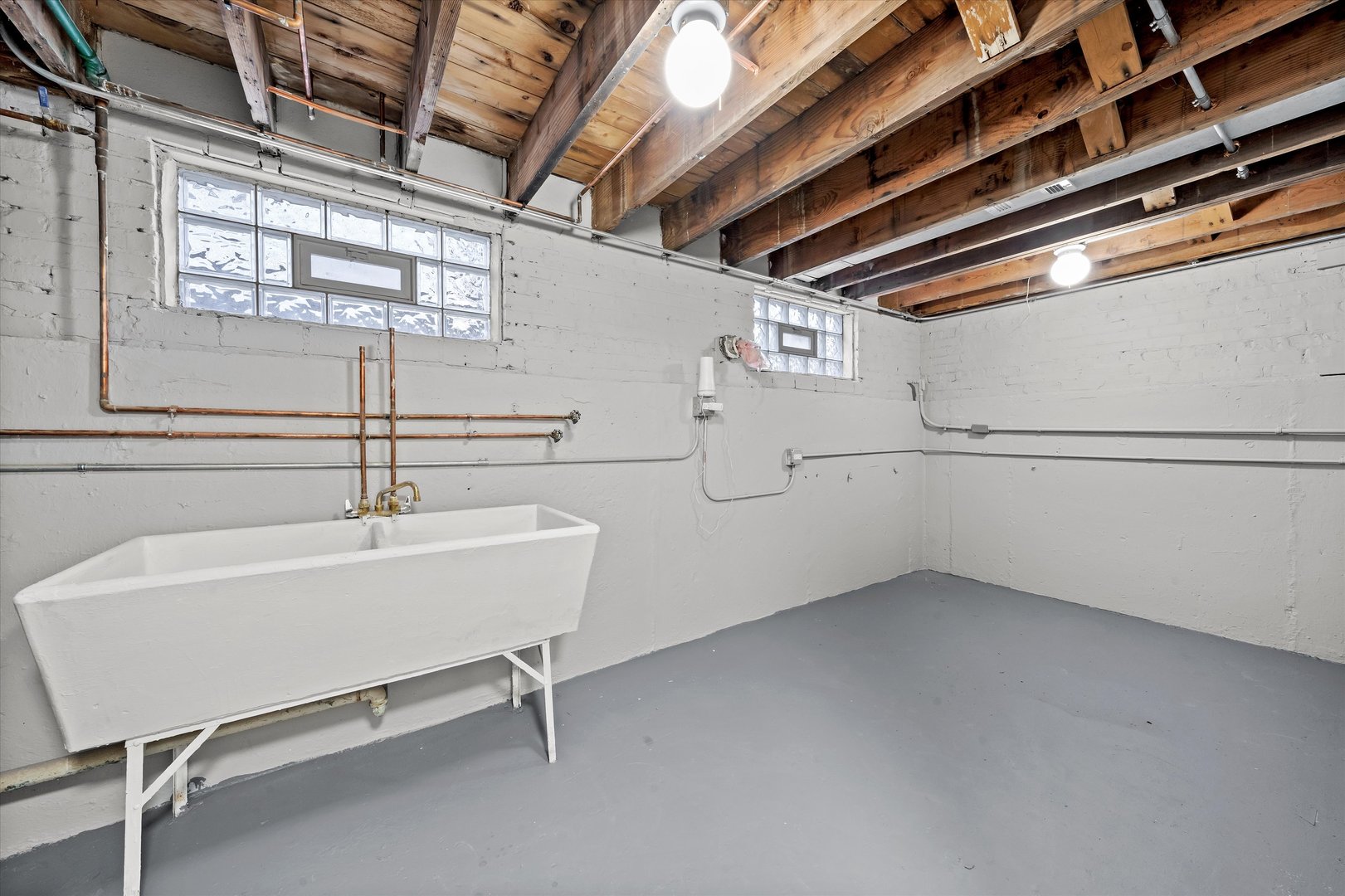 10344 South State Street Chicago, IL 60628 - Photo 17 of 30 a white cabinet with a close up view of dryer