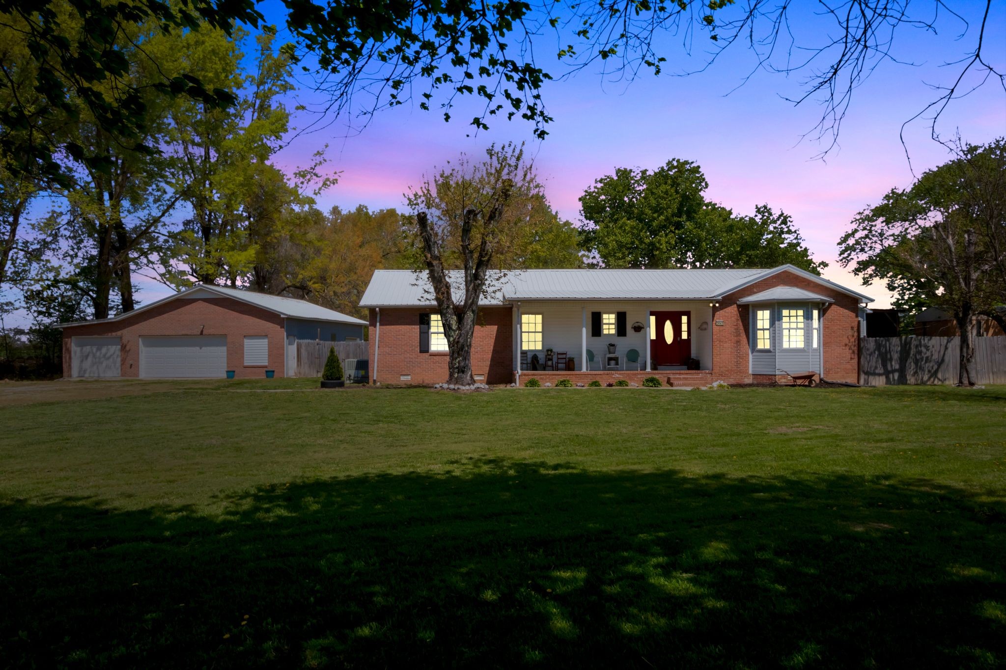2643 Monroe Floyd Road Decherd, TN 37324 - Photo 42 of 42 a front view of a house with a garden