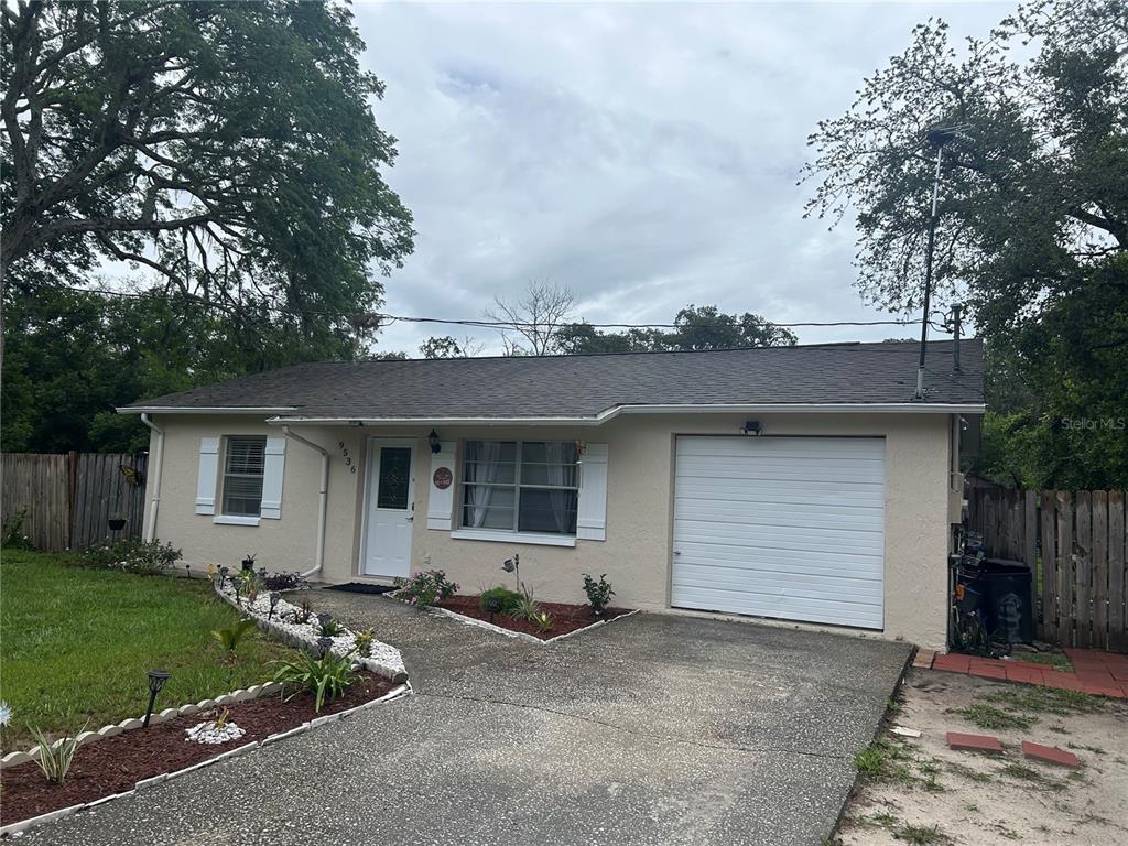 9536 Mayson New Port Richey, FL 34654 - Photo 1 of 1 front view of house with a yard
