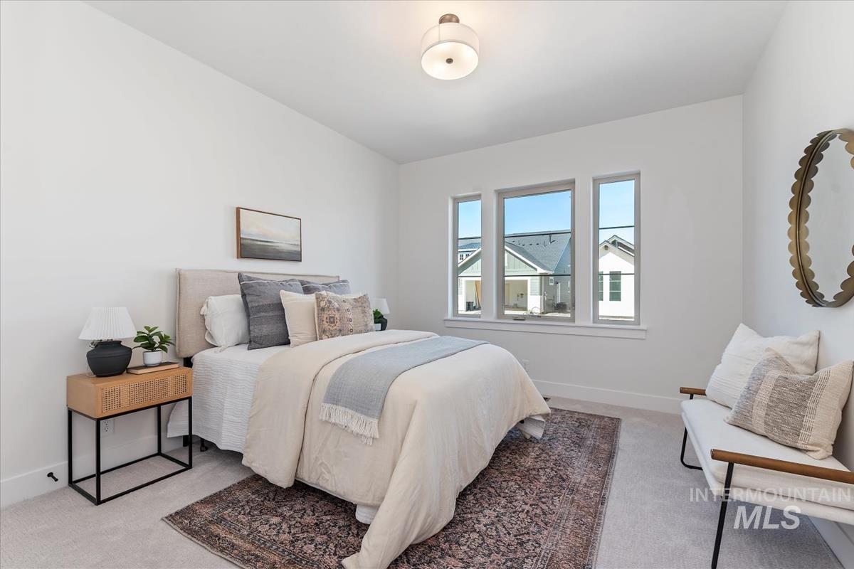 2242 East Rodeo Street Kuna, ID 83634 - Photo 23 of 37 Bedroom featuring light carpet