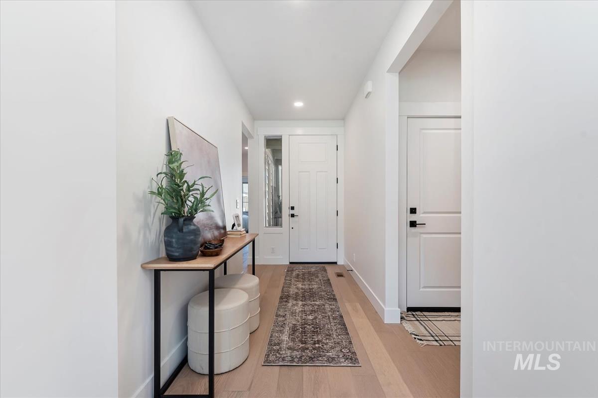 2242 East Rodeo Street Kuna, ID 83634 - Photo 3 of 37 Entrance foyer featuring light wood-style floors and recessed lighting