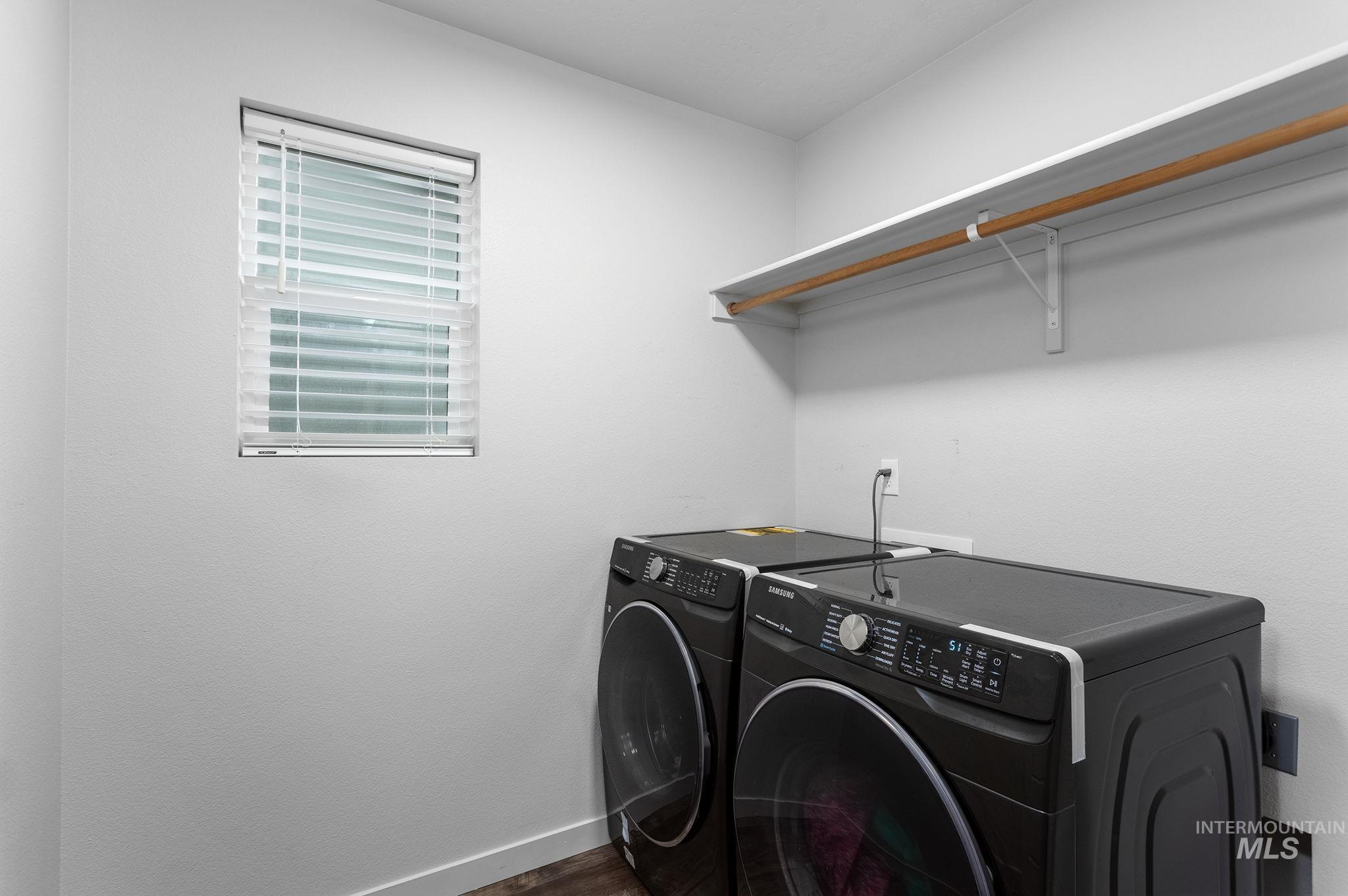 262 South Riggs Spg Avenue Meridian, ID 83642 - Photo 13 of 25 Washroom with separate washer and dryer and dark wood-style floors
