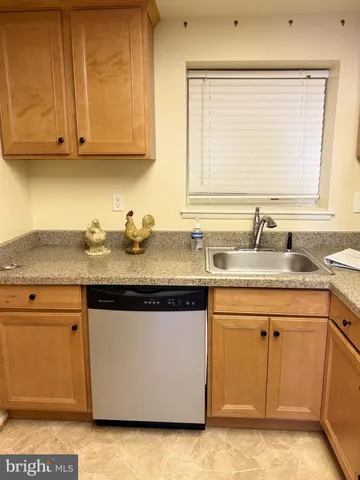 a kitchen with a stove and a microwave