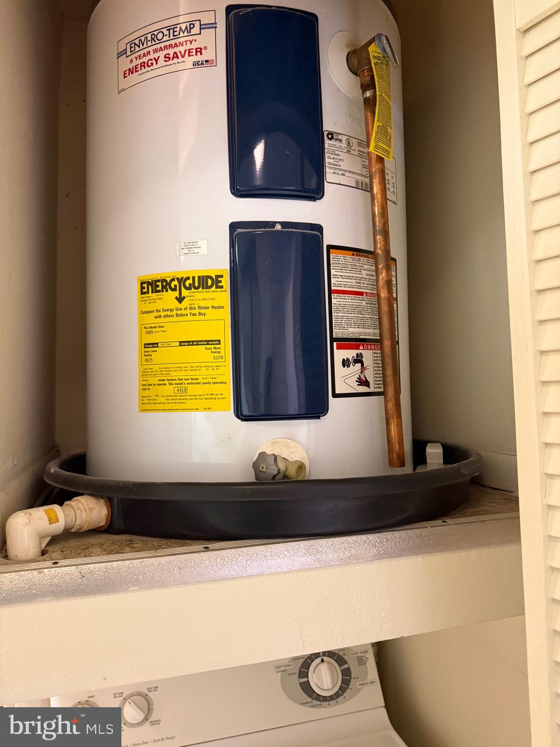 15401 Bassett Lane, Unit 452E Silver Spring, MD 20906 - Photo 29 of 31 a bathroom with a bathtub and a window