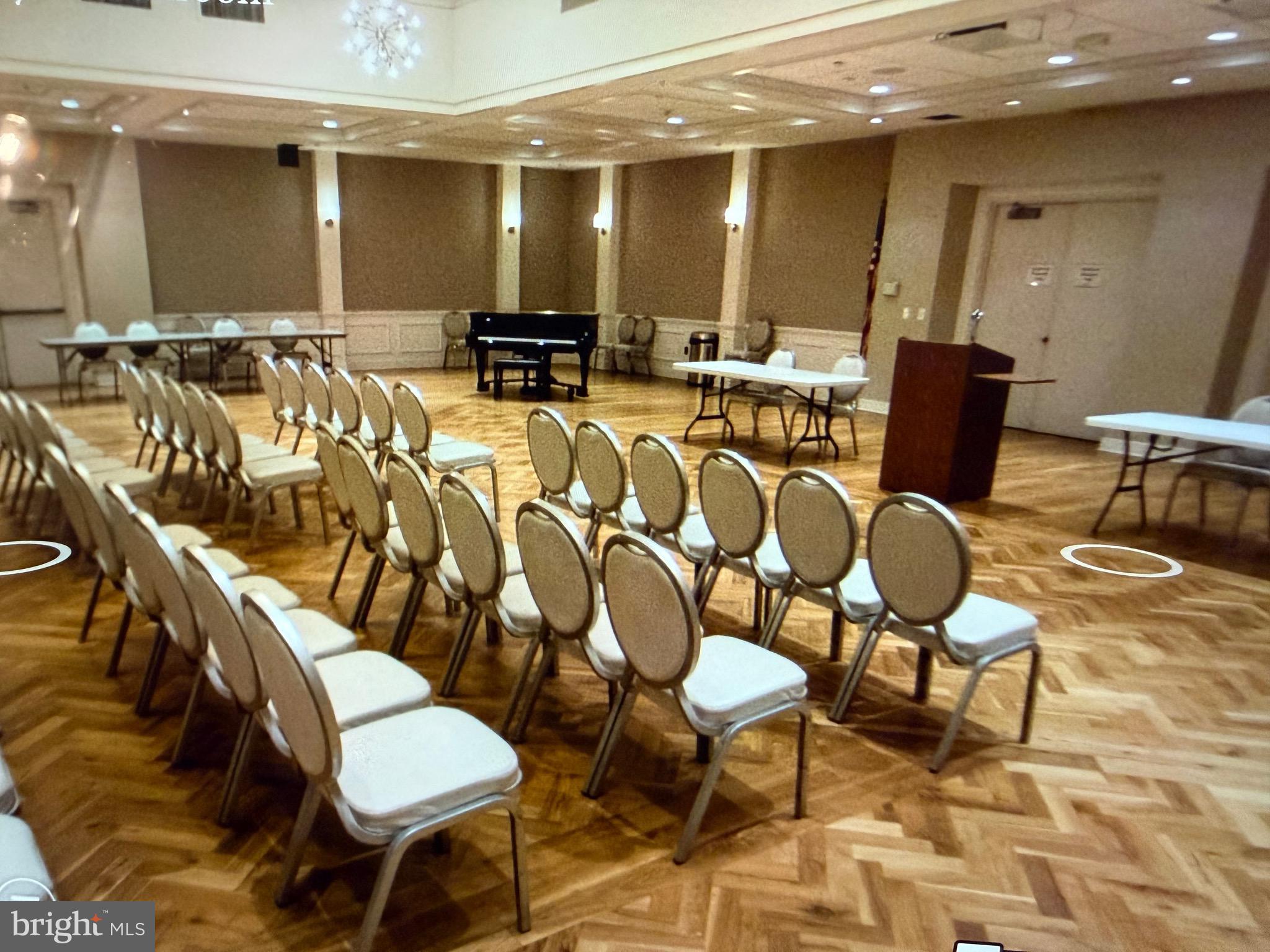 15401 Bassett Lane, Unit 452E Silver Spring, MD 20906 - Photo 7 of 31 a outdoor space with lots of chairs and mirrors