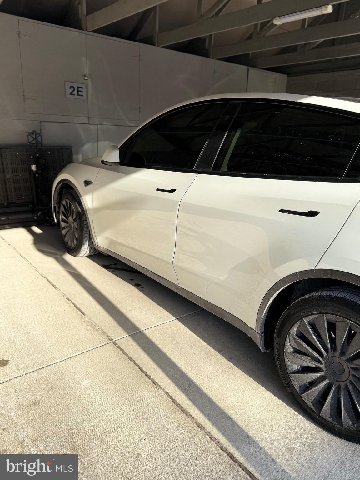 15401 Bassett Lane, Unit 452E Silver Spring, MD 20906 - Photo 8 of 31 a view of car parked in garage
