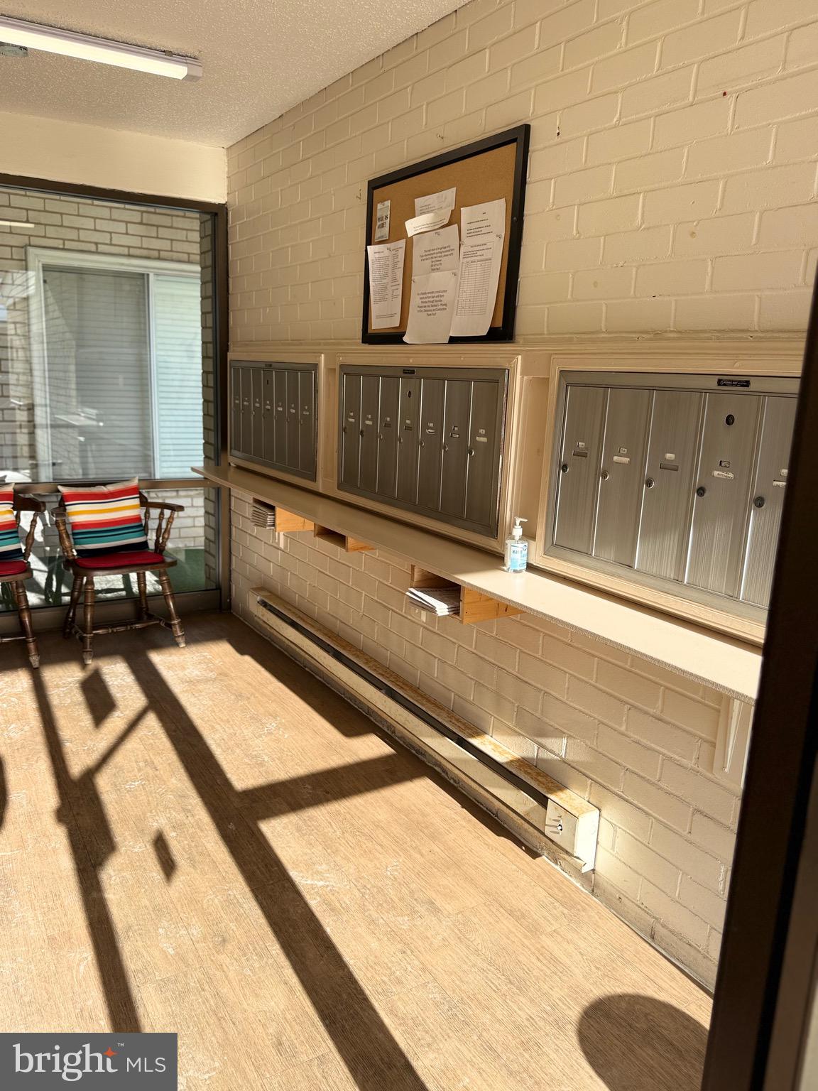 15401 Bassett Lane, Unit 452E Silver Spring, MD 20906 - Photo 10 of 31 a view of a living room and bathroom