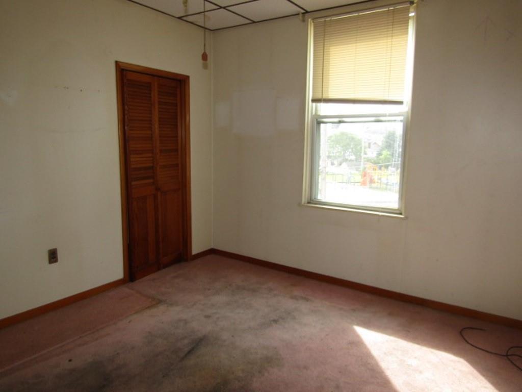 1214 1/2 3rd Street McKees Rocks, PA 15136 - Photo 22 of 28 an empty room with windows