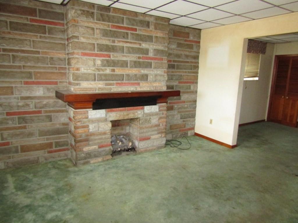 1214 1/2 3rd Street McKees Rocks, PA 15136 - Photo 4 of 28 a view of a room with wooden walls