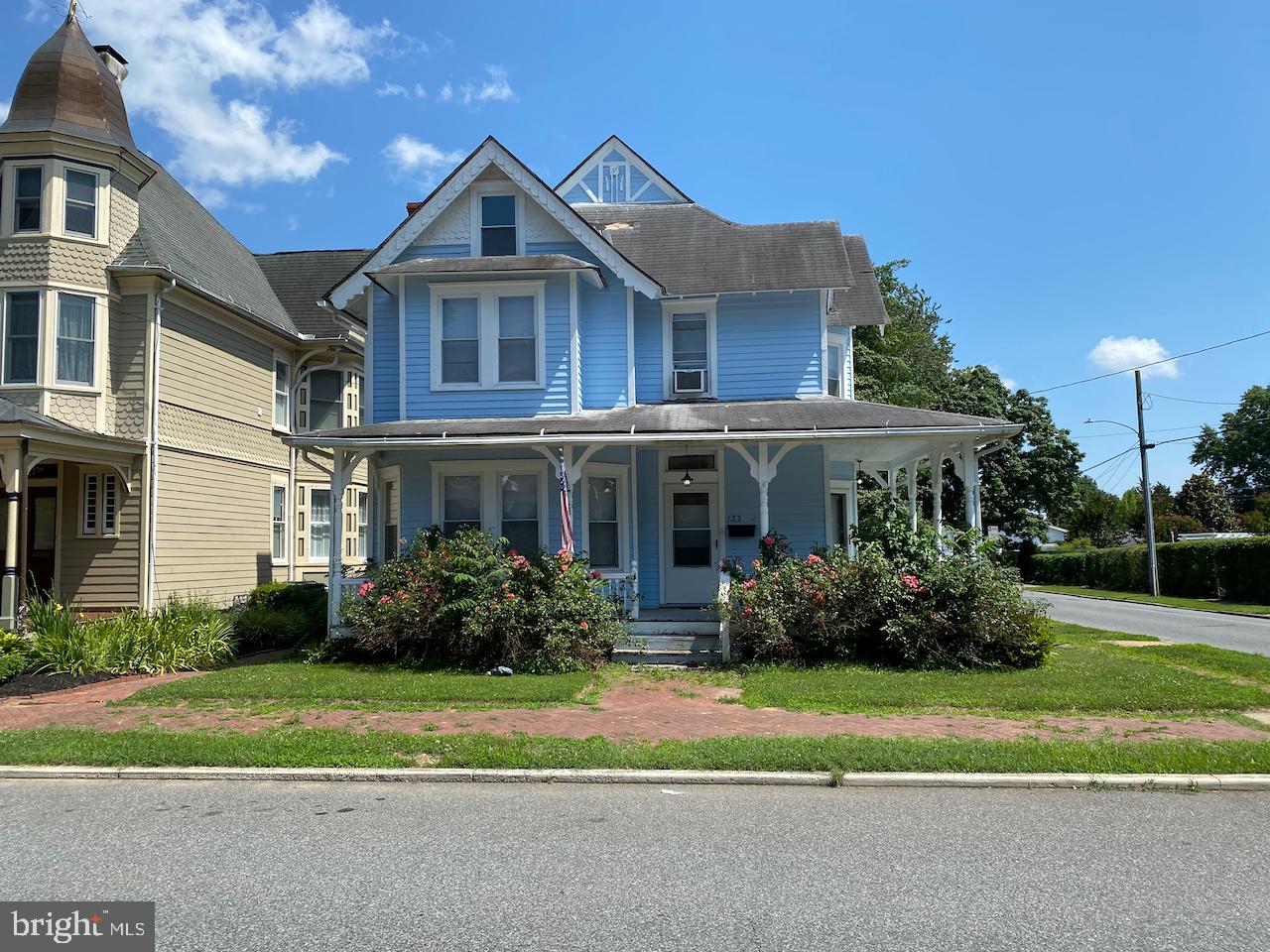 133 West South Street, Unit 2 Smyrna, DE 19977 - Photo 1 of 14 a front view of house with yard and green space