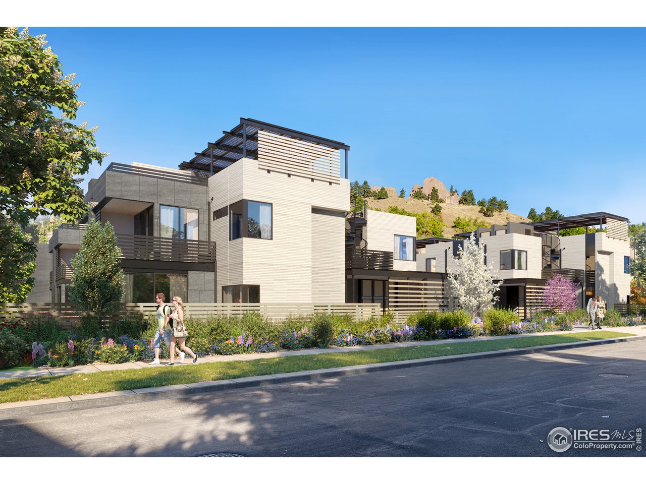 1955 3rd Street, Unit 10 Boulder, CO 80302 - Photo 14 of 15 a front view of a house with a yard