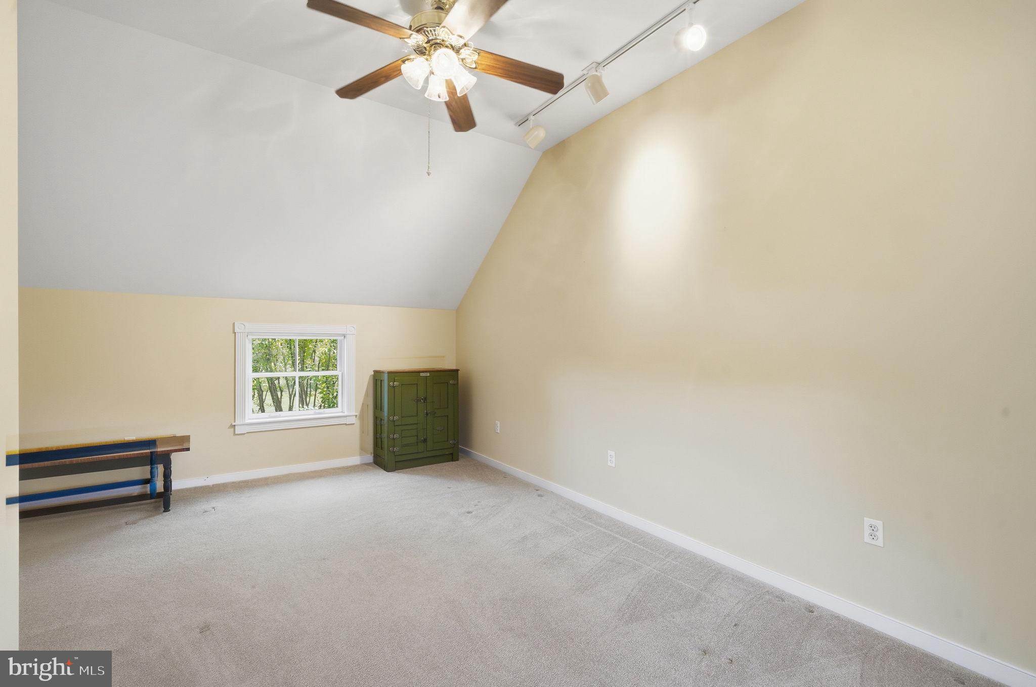 26226 Langs Landing Road Oxford, MD 21654 - Photo 33 of 48 an empty room with windows and fan