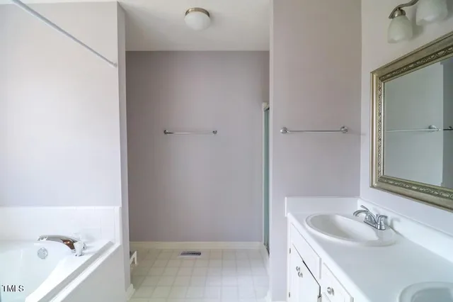 a bathroom with a sink and a tub