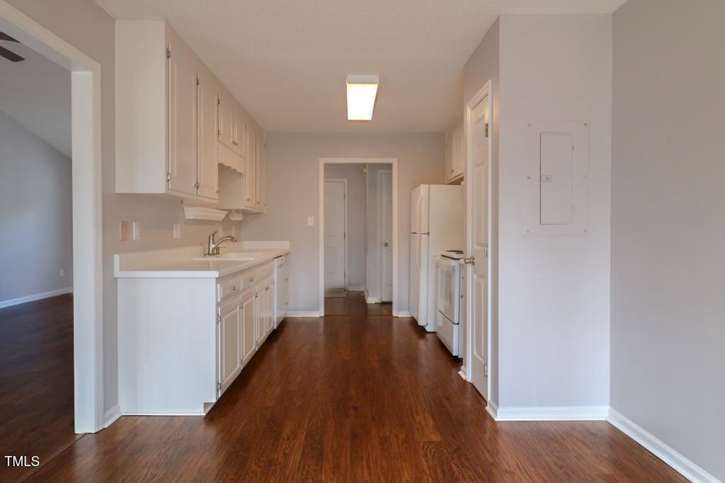 6400 Westborough Drive Raleigh, NC 27612 - Photo 5 of 15 a view of a hallway with wooden floor and closet