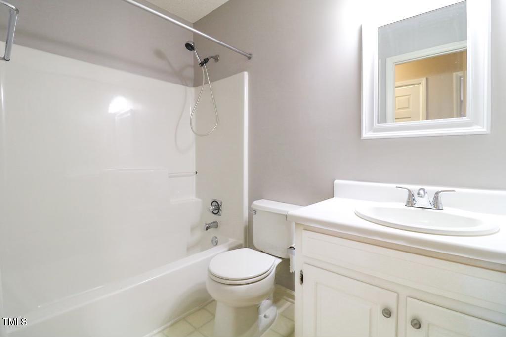6400 Westborough Drive Raleigh, NC 27612 - Photo 6 of 15 a bathroom with a sink a toilet and shower