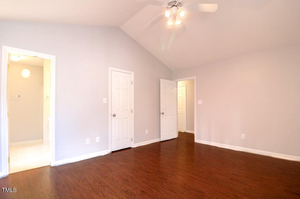 6400 Westborough Drive Raleigh, NC 27612 - Photo 9 of 15 a view of an empty room with wooden floor and a window