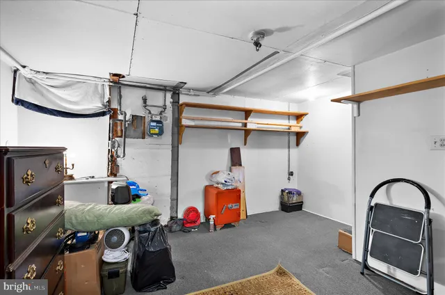 a children room with toys and dresser