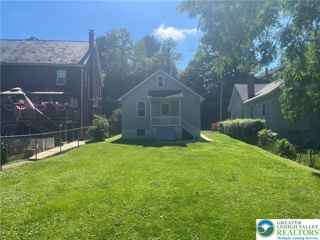 1839 Willow Park Road Bethlehem, PA 18020 - Photo 30 of 35 A well-maintained lawn provides a verdant foreground to a charming home with a welcoming front porch.