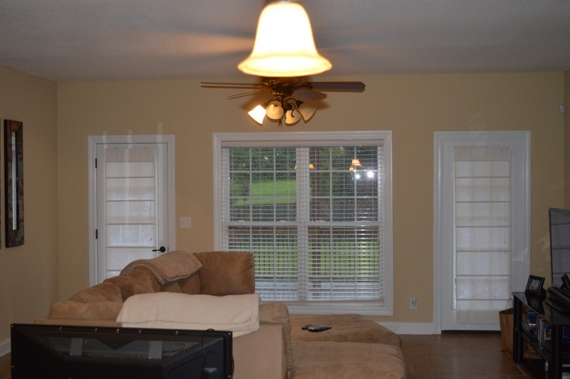 812 Little Springs Road Clarksville, TN 37040 - Photo 14 of 19 a table and chair in a room next to a window