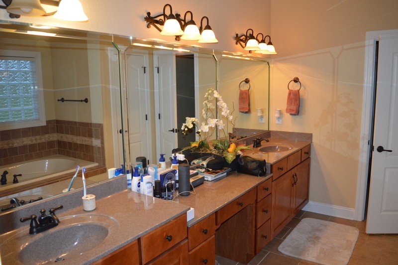 812 Little Springs Road Clarksville, TN 37040 - Photo 7 of 19 a bathroom with a double vanity sink mirror and bathtub