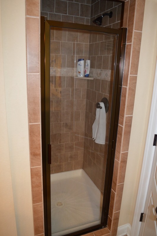 812 Little Springs Road Clarksville, TN 37040 - Photo 9 of 19 a bathroom with a glass shower door