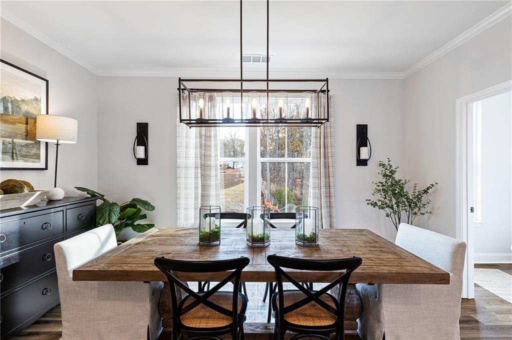 821 Cameron Trail Acworth, GA 30102 - Photo 3 of 30 a view of a dining room with furniture and window