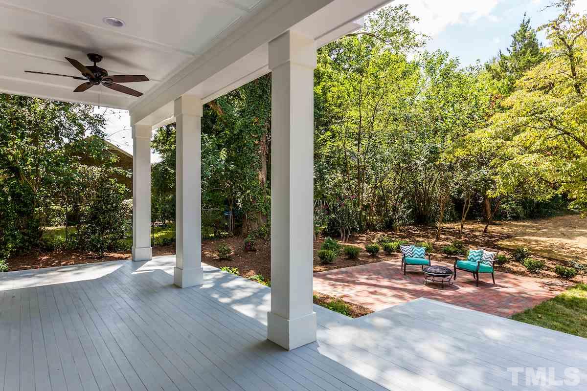 1609 Oberlin Road Raleigh, NC 27608 - Photo 22 of 25 a view of a porch with wooden floor and porch