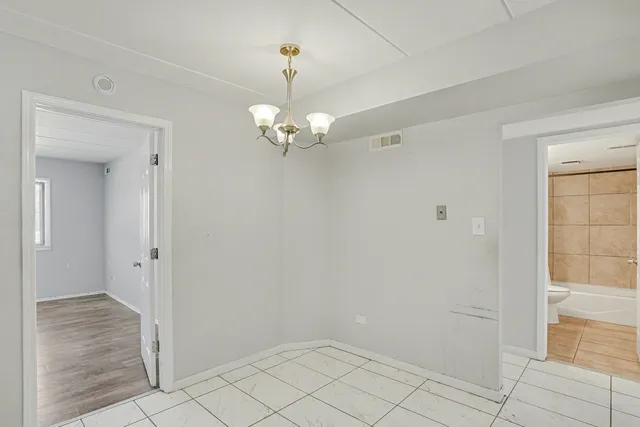 a view of a chandelier in a room