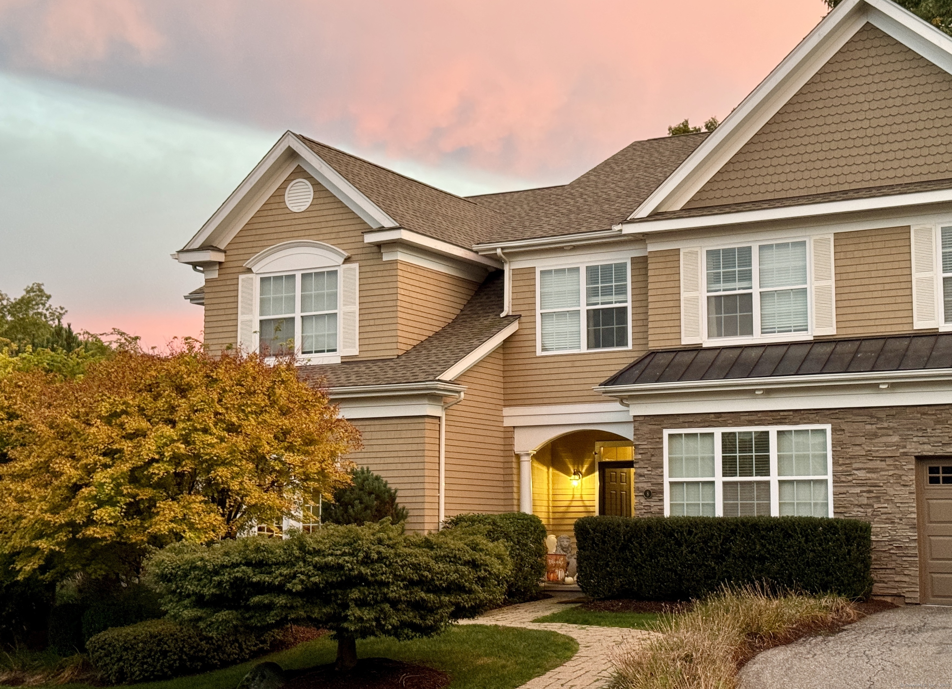8 Haley Lane, Unit 8 Litchfield, CT 06759 - Photo 1 of 1 a front view of a house with a yard