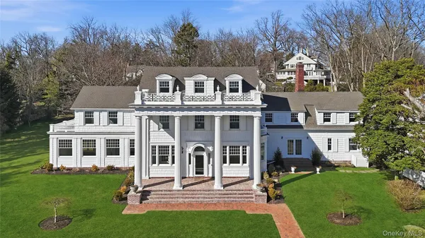 a aerial view of a house with a yard