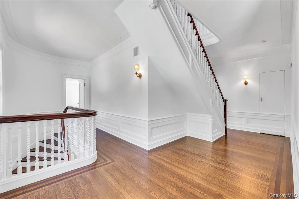 158 East Shore Road Huntington, NY 11743 - Photo 23 of 42 Second Floor Landing w/ Staircase to Third Floor - Incredible Detail and Craftmanship on Staircase