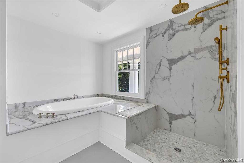 158 East Shore Road Huntington Bay, NY 11743 - Photo 28 of 50 a bathroom with a granite countertop sink a toilet and shower