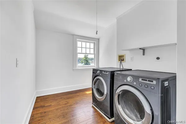 a utility room with dryer and washer