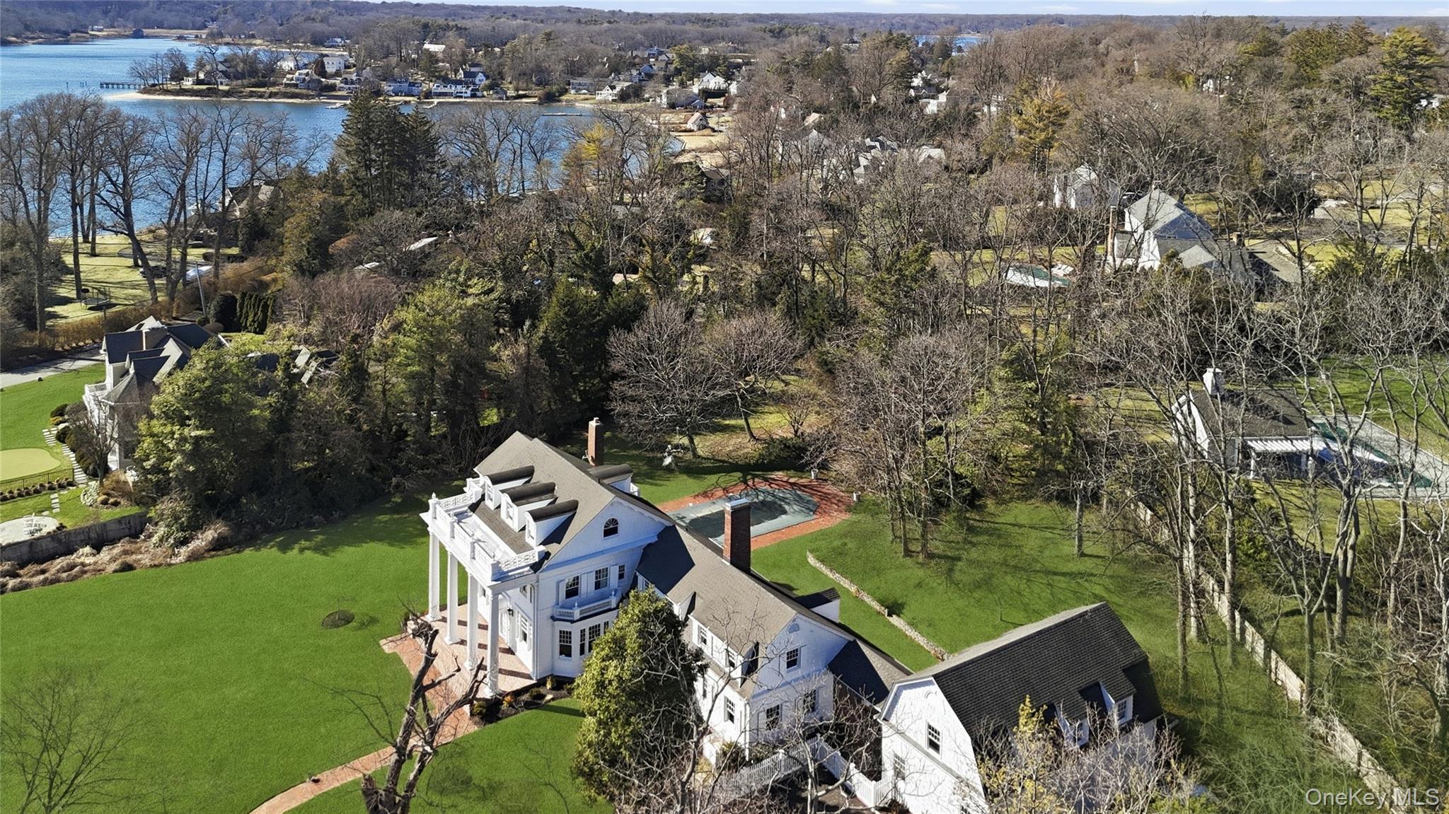 158 East Shore Road Huntington Bay, NY 11743 - Photo 5 of 50 an aerial view of a house with a yard basket ball court and outdoor seating