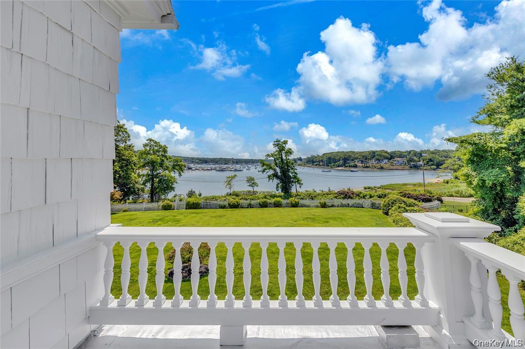 158 East Shore Road Huntington Bay, NY 11743 - Photo 6 of 50 a view of a swimming pool with a table and chairs