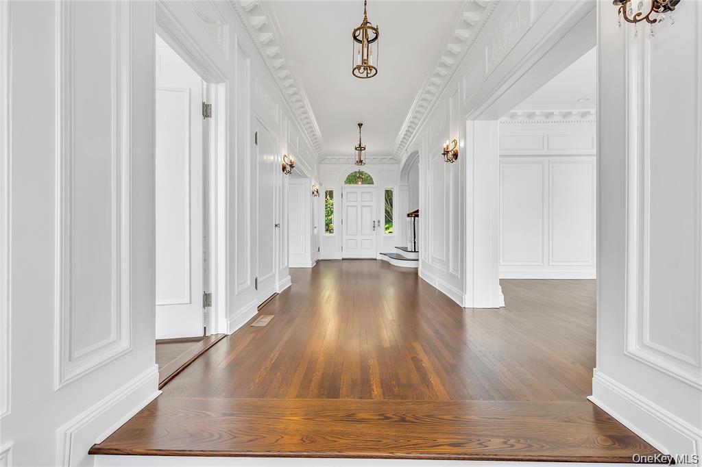 158 East Shore Road Huntington Bay, NY 11743 - Photo 10 of 50 a view of a hallway view with wooden floor and staircase