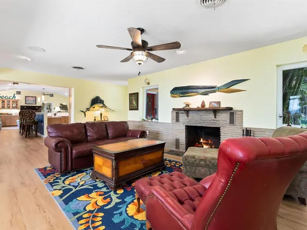 a living room with furniture and a table