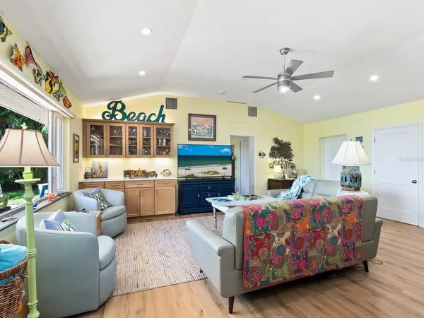 a kitchen with a cabinets and window