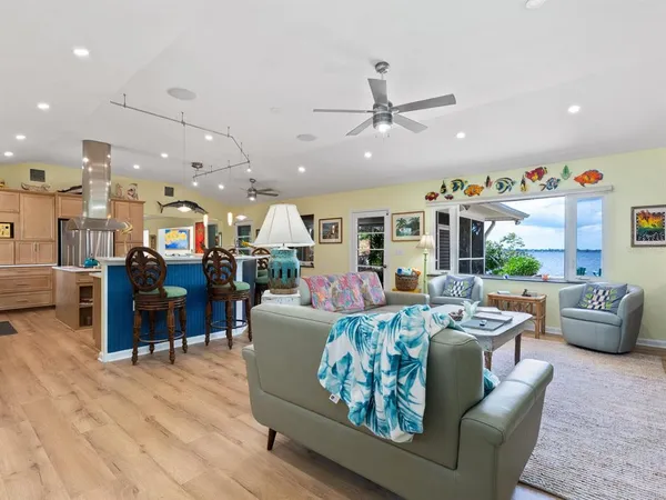 a kitchen with counter top space a sink and appliances