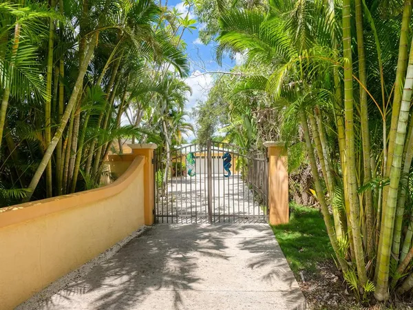 a view of a chairs and table in the patio