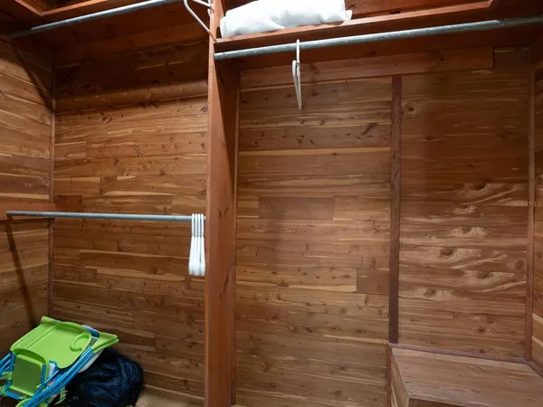 a view of a backyard with a sitting area and furniture