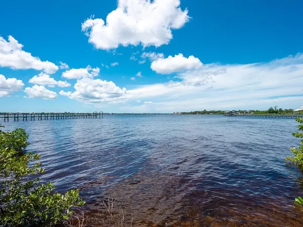 a view of a chairs and table in the patio