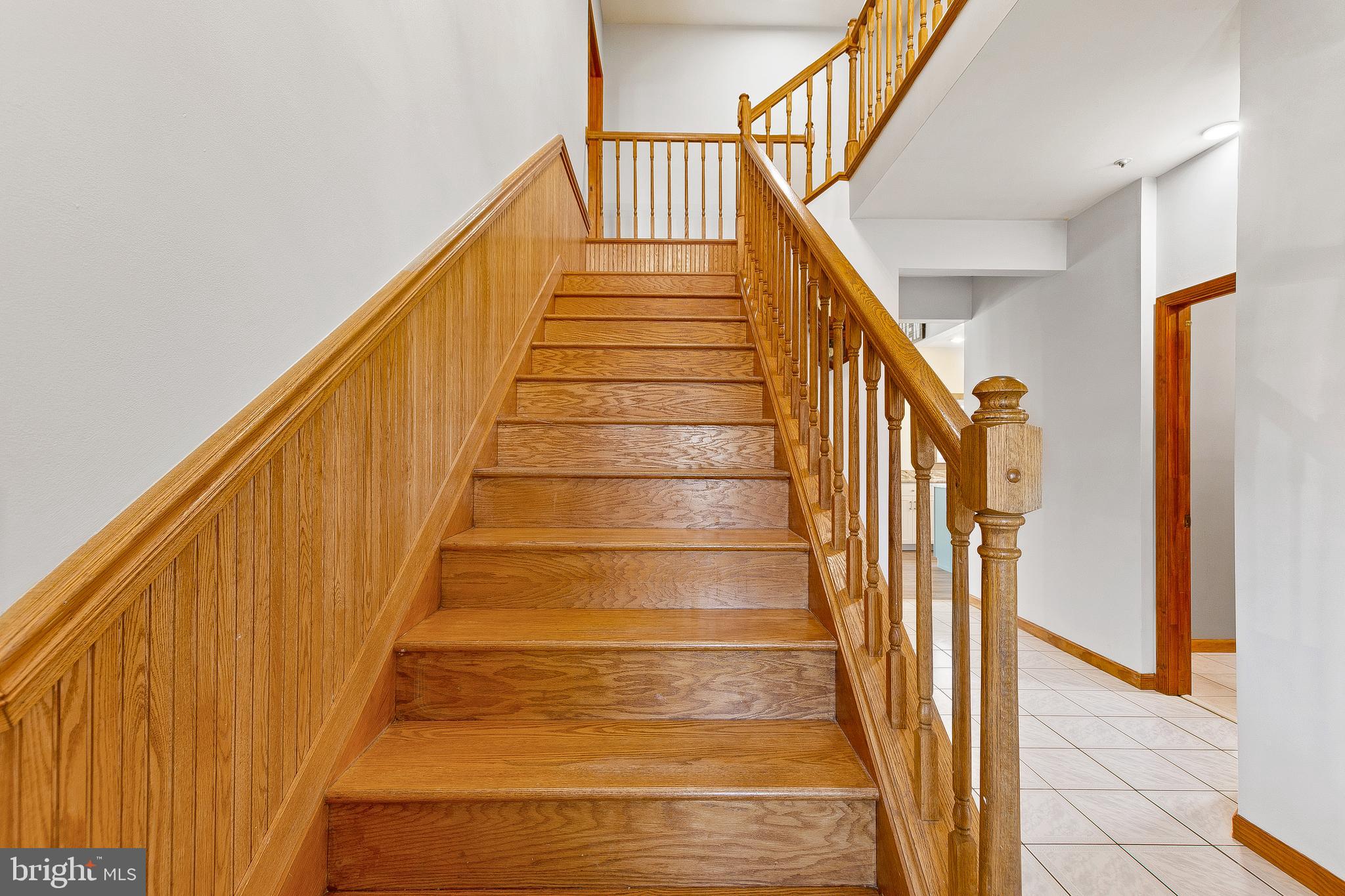 10905 Cross Rd Trail Brandywine, MD 20613 - Photo 6 of 52 Entry foyer staircase