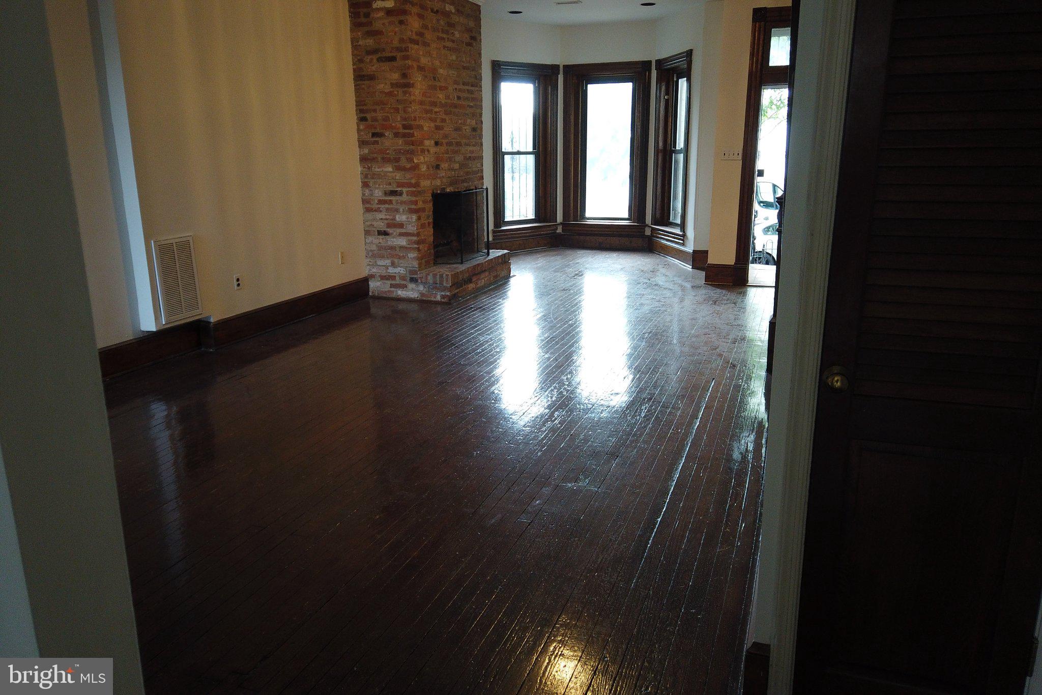 604 9th Street Northeast Washington, DC 20002 - Photo 2 of 28 Spacious room with gleaming floors.