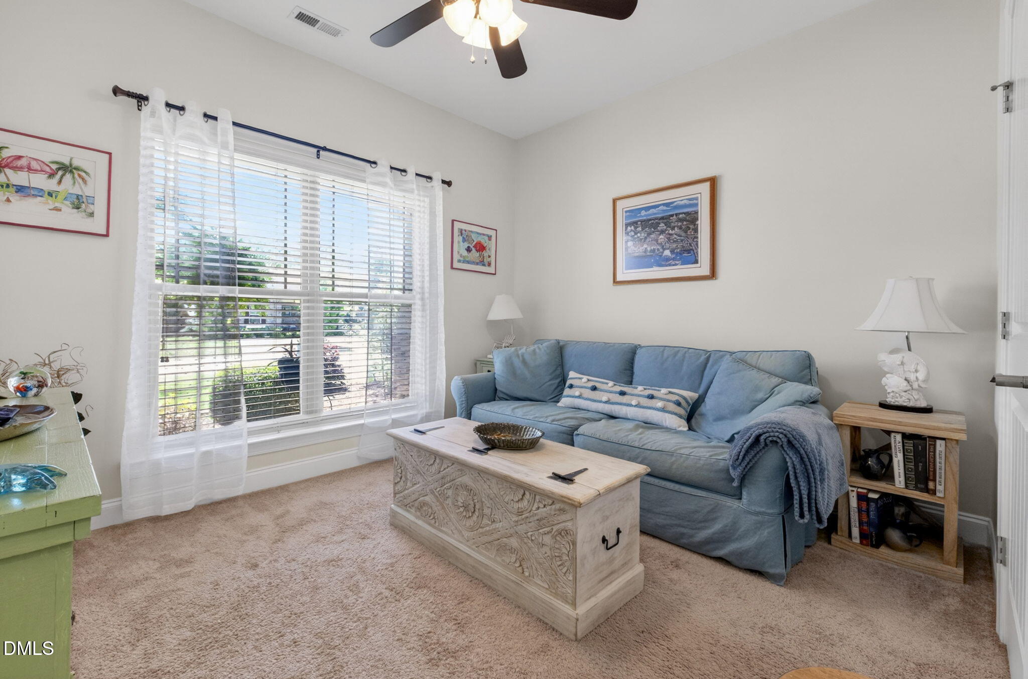 20 Deep Clay Circle Angier, NC 27501 - Photo 34 of 54 a living room with furniture and a large window