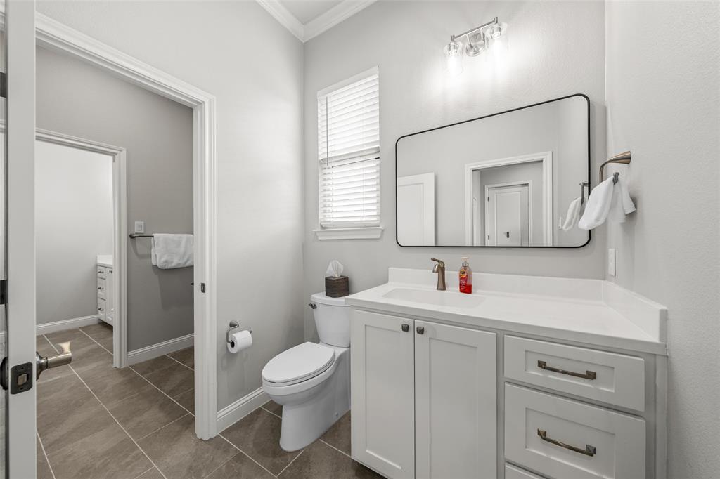 624 Lindsay Lane Robinson, TX 76706 - Photo 18 of 39 a bathroom with a toilet sink and mirror