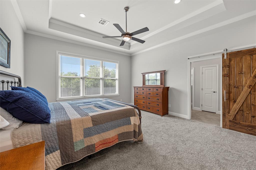 624 Lindsay Lane Robinson, TX 76706 - Photo 20 of 39 a bedroom with a bed next to a window
