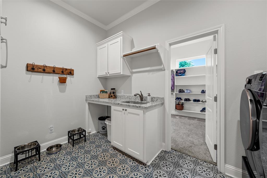 624 Lindsay Lane Robinson, TX 76706 - Photo 25 of 39 a kitchen with sink cabinets and appliances