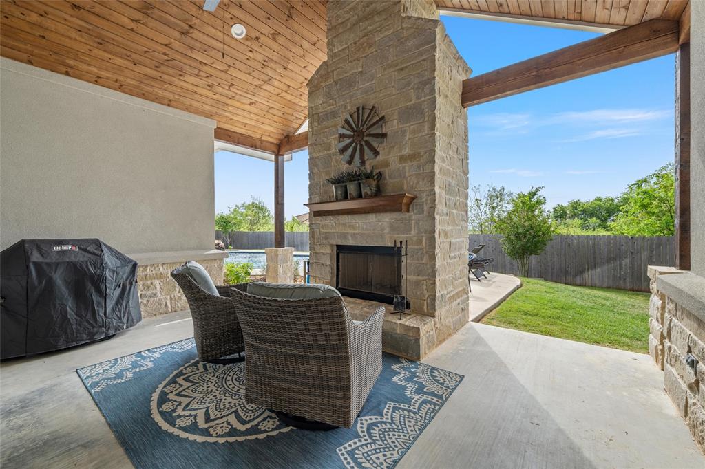 624 Lindsay Lane Robinson, TX 76706 - Photo 30 of 39 a view of a porch with furniture and a fire pit