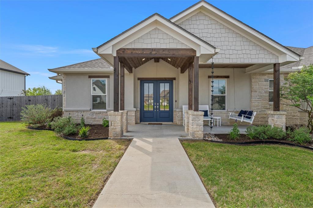 624 Lindsay Lane Robinson, TX 76706 - Photo 3 of 39 a front view of a house with garden